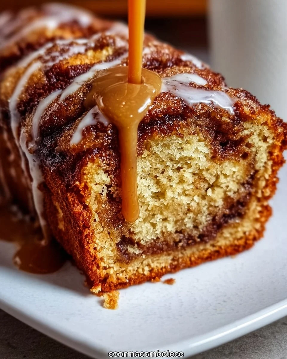 Delicious cinnamon roll banana bread with swirls of cinnamon and a soft texture.