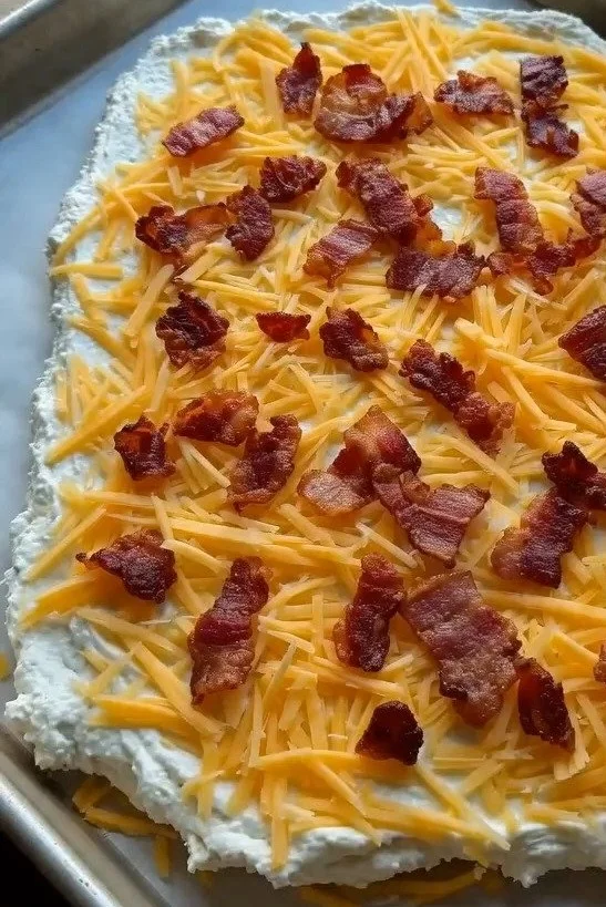 Delicious Cottage Cheese Loaded Bacon Cheddar Fry Sheet served on a plate