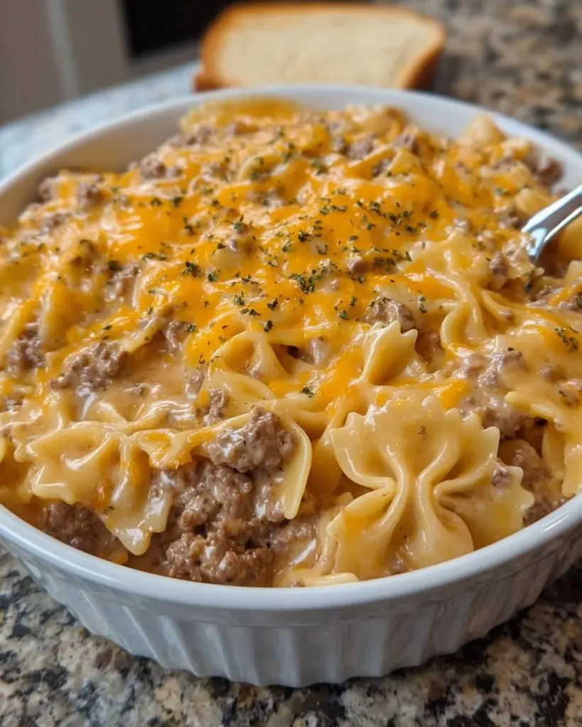 Creamy cheesy beef and bowtie pasta dish, a hearty dinner option for families