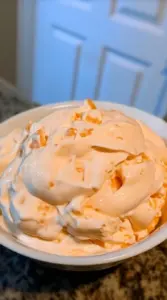 Delicious Orange Creamsicle Fluff dessert in a bowl