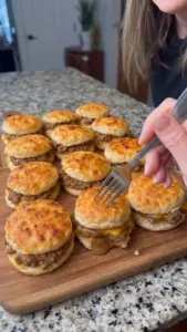 Delicious sausage gravy served over warm biscuits on a plate