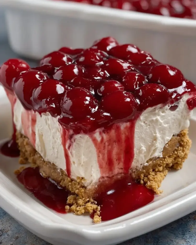 Delicious Sugar-Free Cherry Delight dessert garnished with fresh cherries.