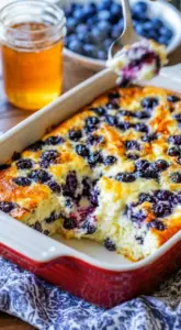 Low-calorie blueberry cottage cheese breakfast bake in a baking dish