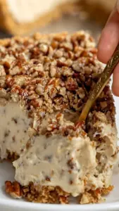 Deliciously creamy Pecan Cream Pie topped with crunchy pecans