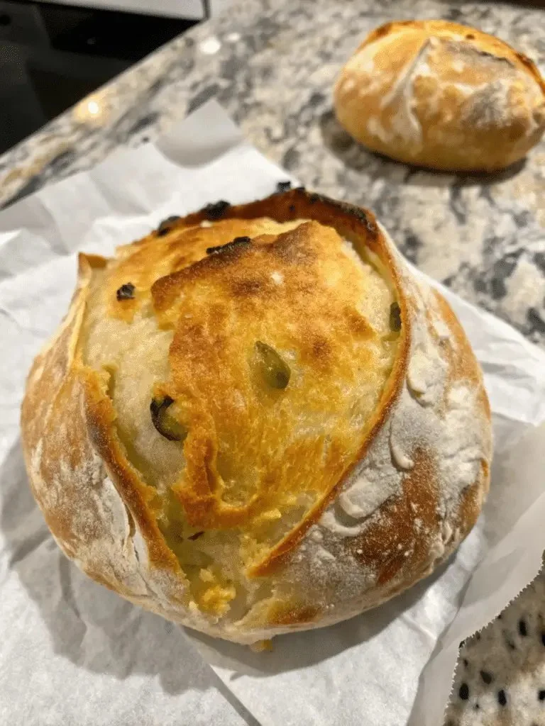 Two freshly baked sourdough loaves ready to be served