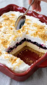 Sugar-free no-bake lemon blueberry dessert served in a glass dish