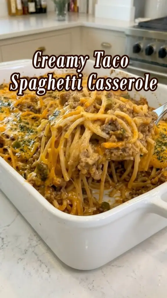 A delicious Taco Spaghetti Casserole topped with cheese and spices
