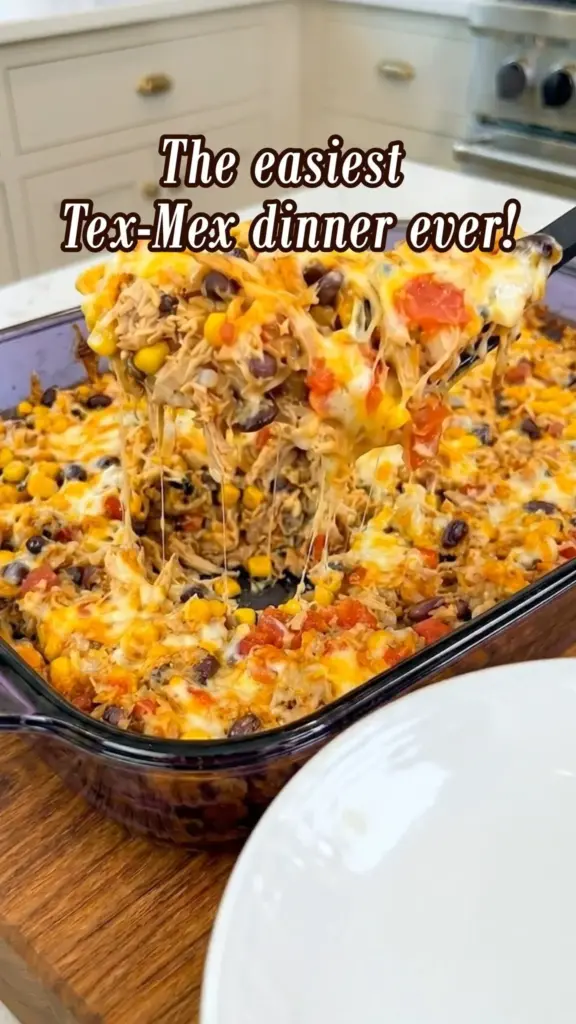 Delicious Tex-Mex Chicken Casserole topped with cheese and spices
