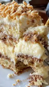 White German chocolate cake with cheesecake center, sliced on a plate